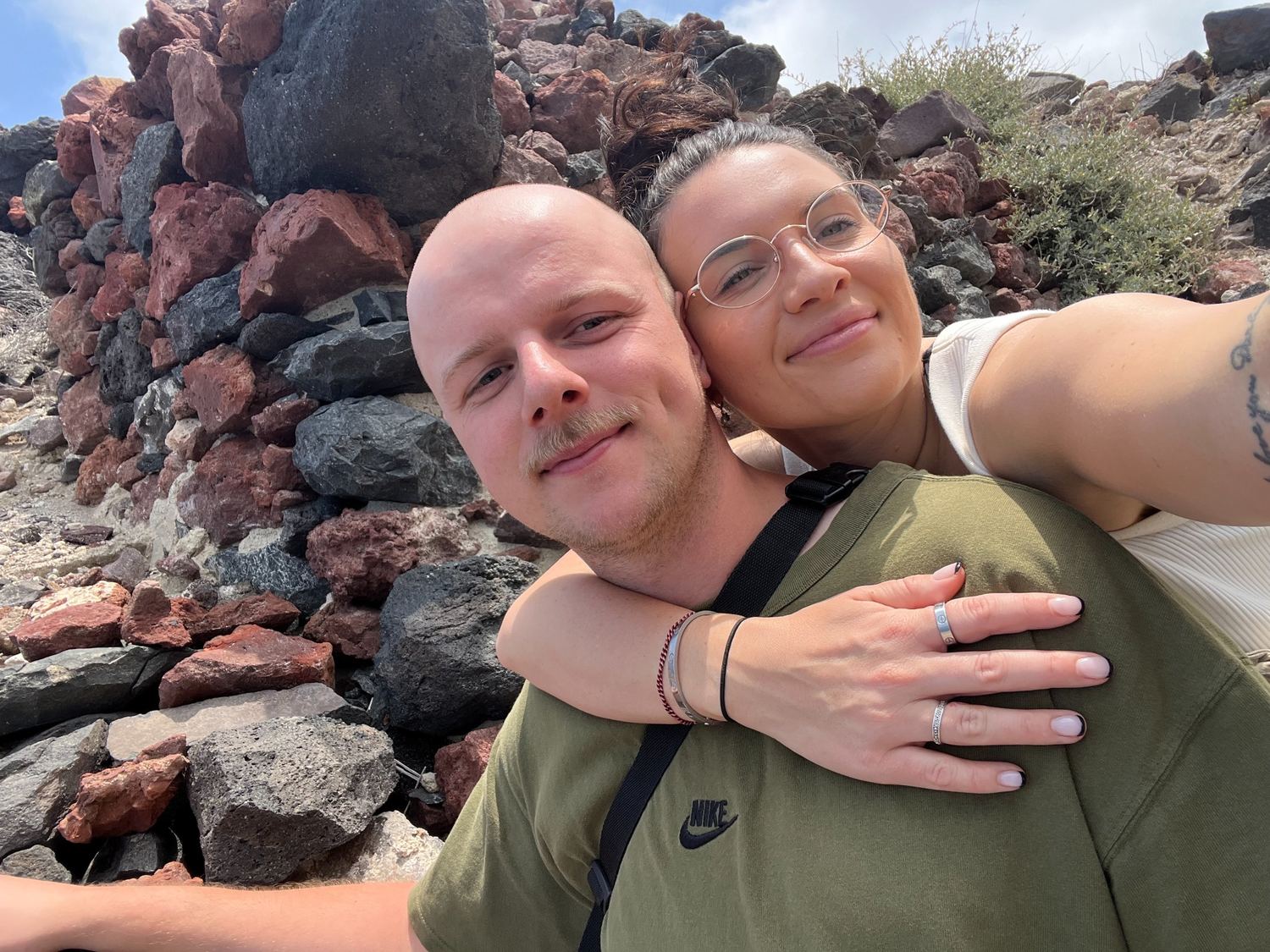 Bianca and Thomas on holiday by volcanic rocks